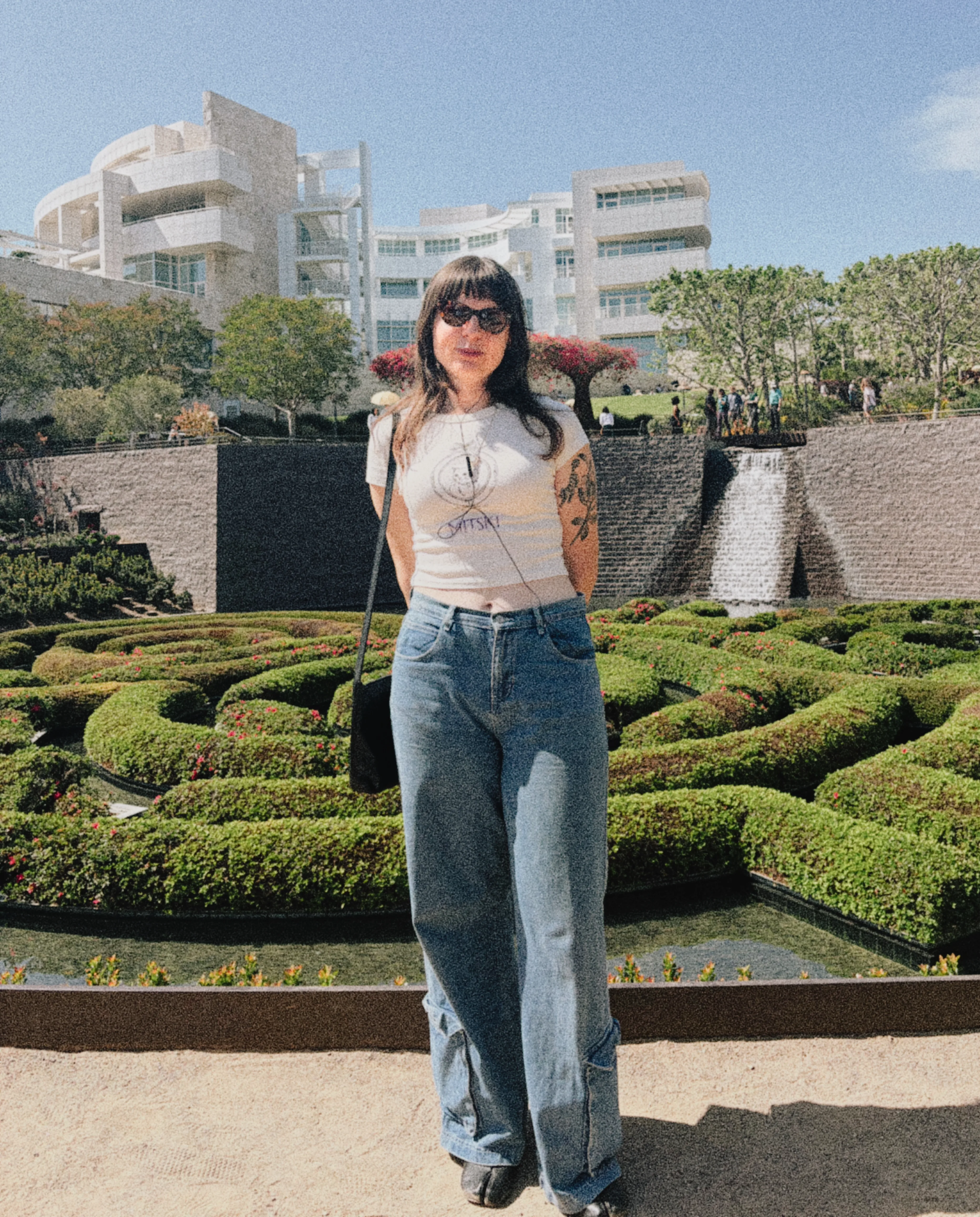 Jordan Navarro standing in the Getty Center garden